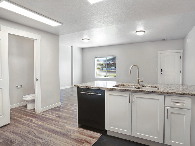 Kitchen, Living Room, and Bathroom | The Ranches Townhomes