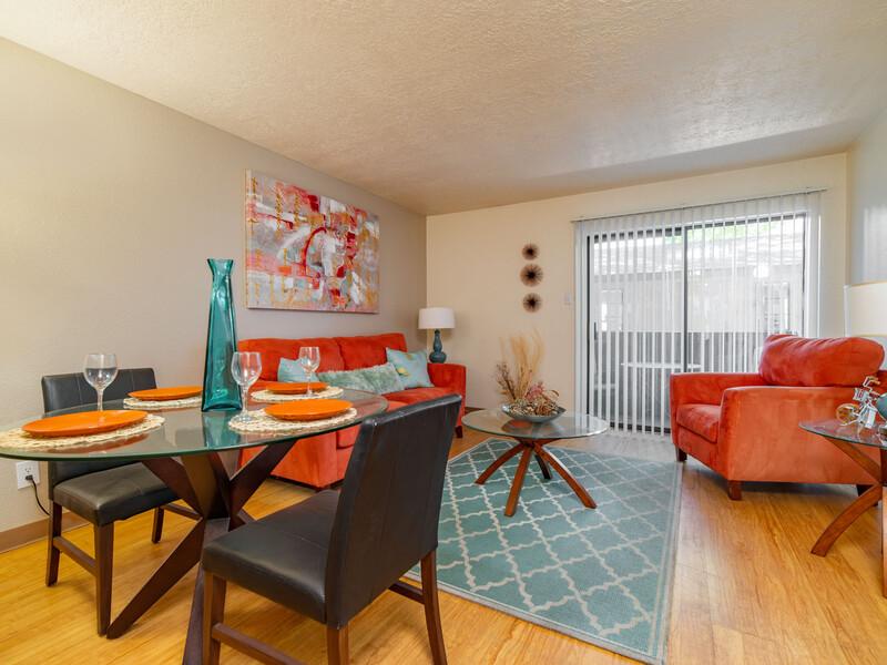Living Room and Dining Area | Candlelight Square Apartments in Albuquerque, NM