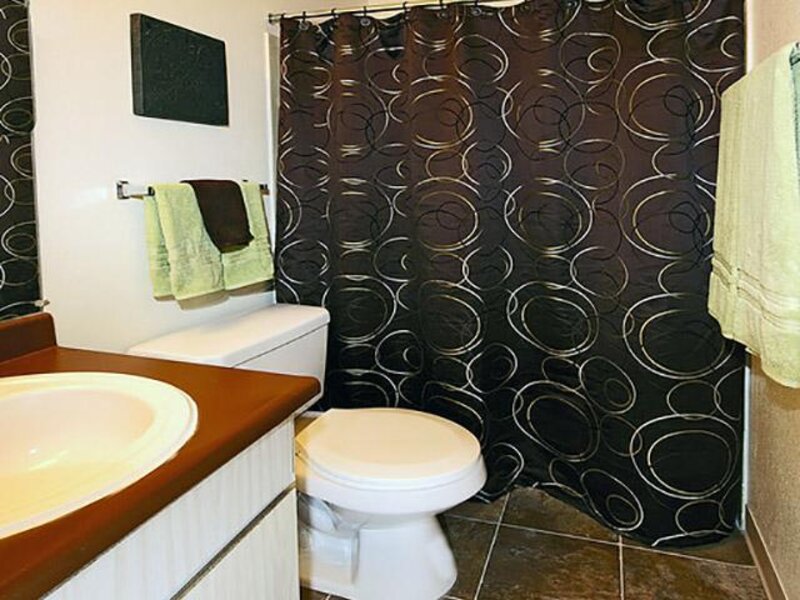 Bathroom with Shower Curtain Drawn Shut