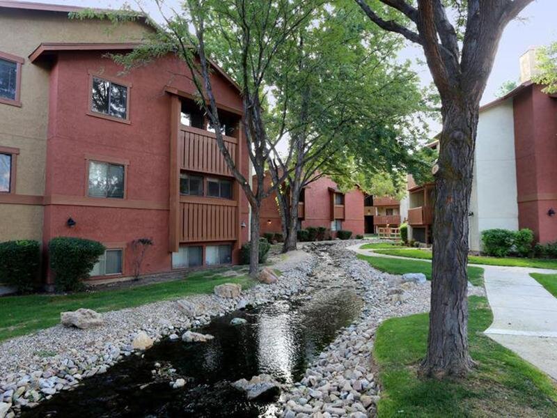 Creek next to Apartment Buildings