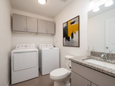 Staged Bathroom and Laundry Area | Terra at Enchanted Hills