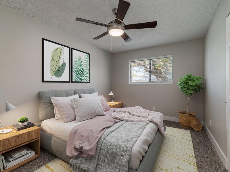 Bedroom with a Ceiling Fan - Furnished | Tesota Midtown Albuquerque Apartments