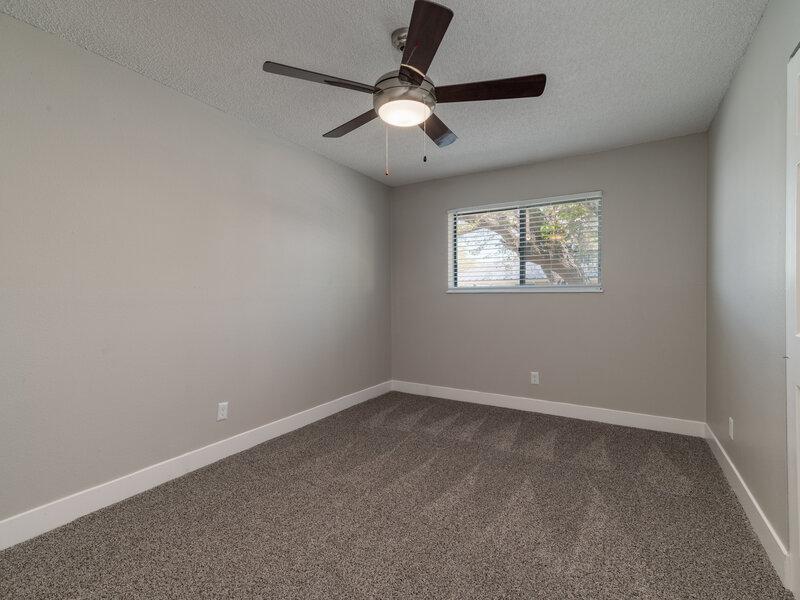 Bedroom with a Ceiling Fan | Tesota Midtown Apartments in Albuquerque, NM