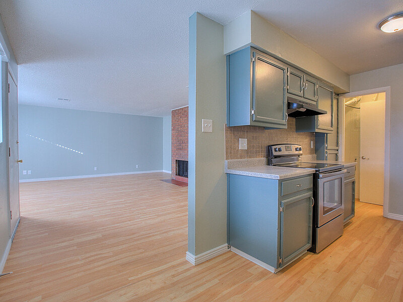 Kitchen and Front Room | Chelsea Village Apartments in Albuquerque, NM
