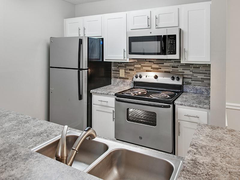Kitchen Countertops | Inverness Lakes Apartments in Mobile, AL