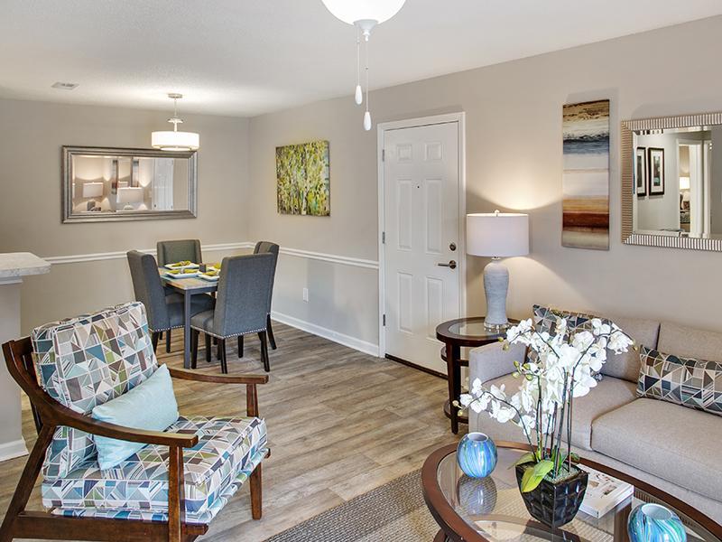 Living Room and Dining Area | Inverness Lakes Apartments in Mobile, AL