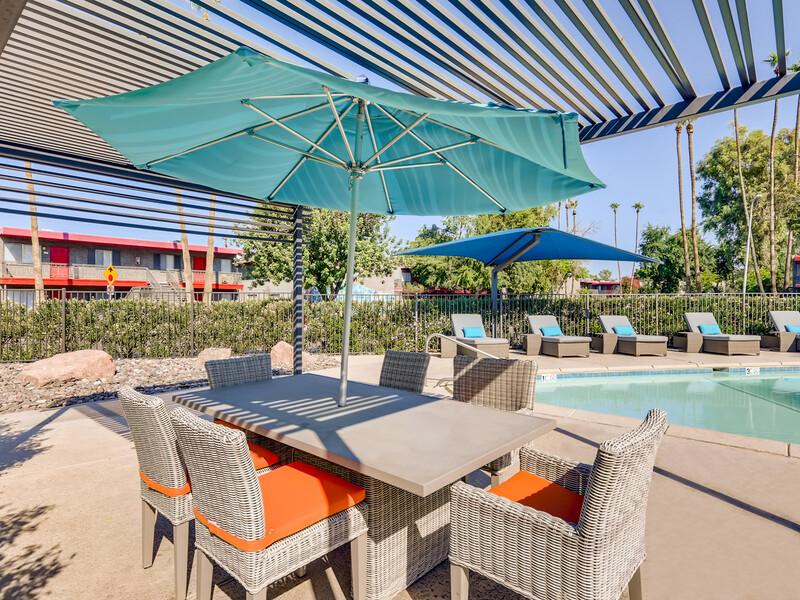 Poolside Table | Emerson Park Apartment Homes in Tempe, AZ