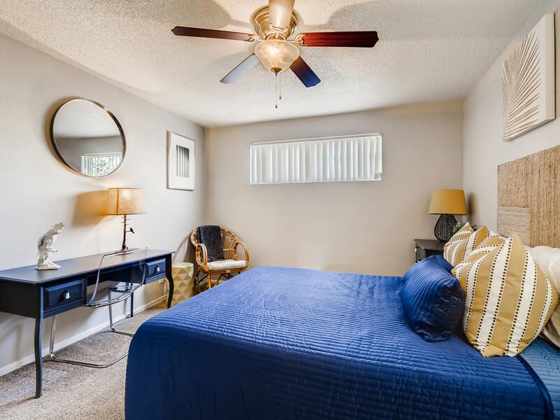 Bedroom with a Ceiling Fan | Omnia McClintock Apartments in Tempe, AZ