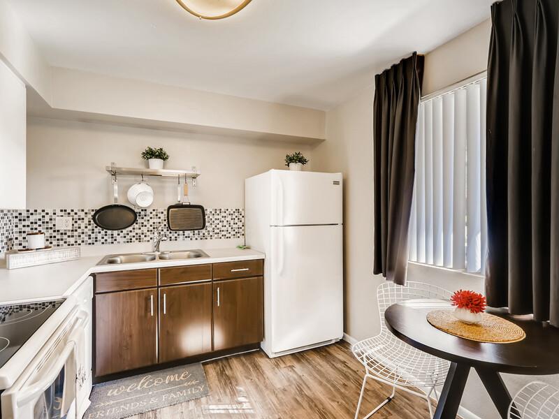 Kitchen and Dining Area | Omnia McClintock Apartments in Tempe, AZ