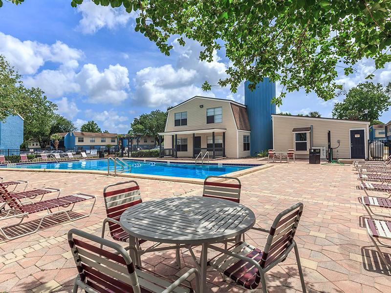 Poolside Table | Patriot Plaza Apartments in Jacksonville, FL