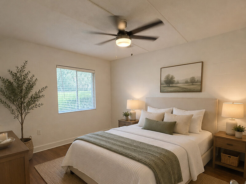 Bedroom with Ceiling Fan and Wall Art | The Edge @ 401