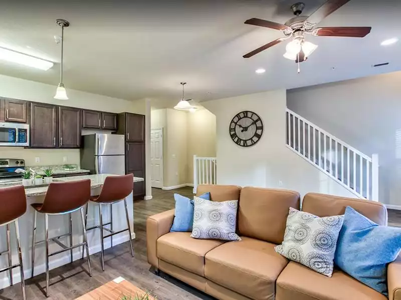 Living Room & Kitchen | Hayden Commons Apartments in Tallahassee