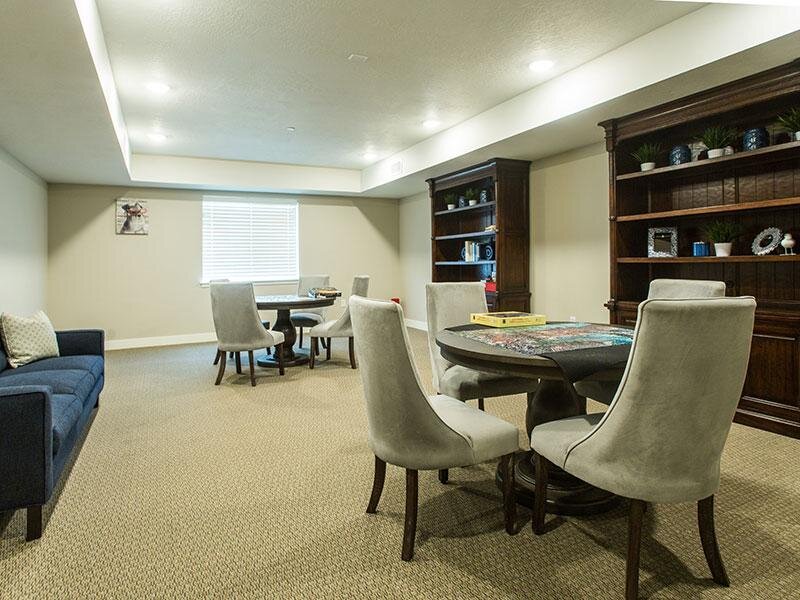 Community Room with Jigsaw Puzzles | Avalon Senior Apartments in Lindon, UT