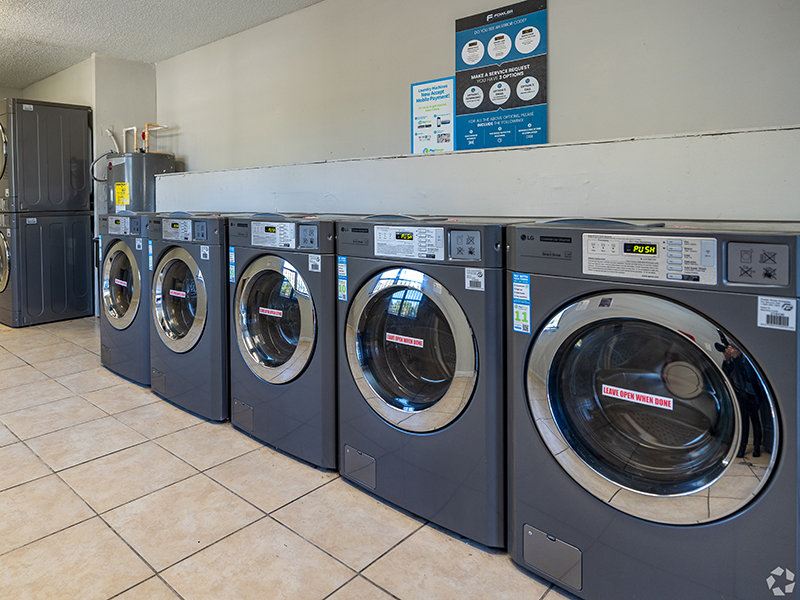 Laundry Facility | Caroline Village Apartments