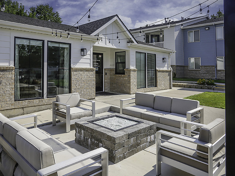 Outdoor Seating Around Firepit | Creekside Village Apartment Homes