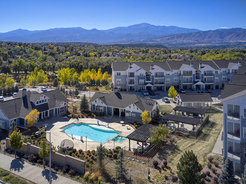 Shimming Pool Aerial View | Peaks at Woodmen Apartments in Colorado Springs, CO