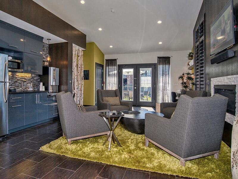 Community Kitchen and Sitting Area | Arapahoe Club Apts in Denver, UT