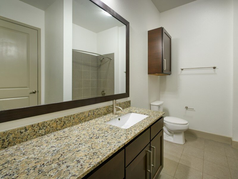 Bathroom Counter and Sink | Helios Apartments
