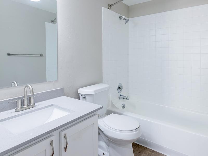 Bathroom with Tiled Shower | The Station Apartments