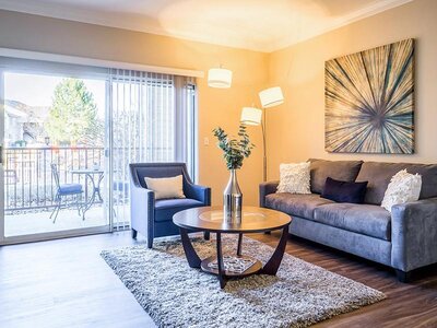 Living Room and Balcony | Regatta Apartments for Rent in Northglenn