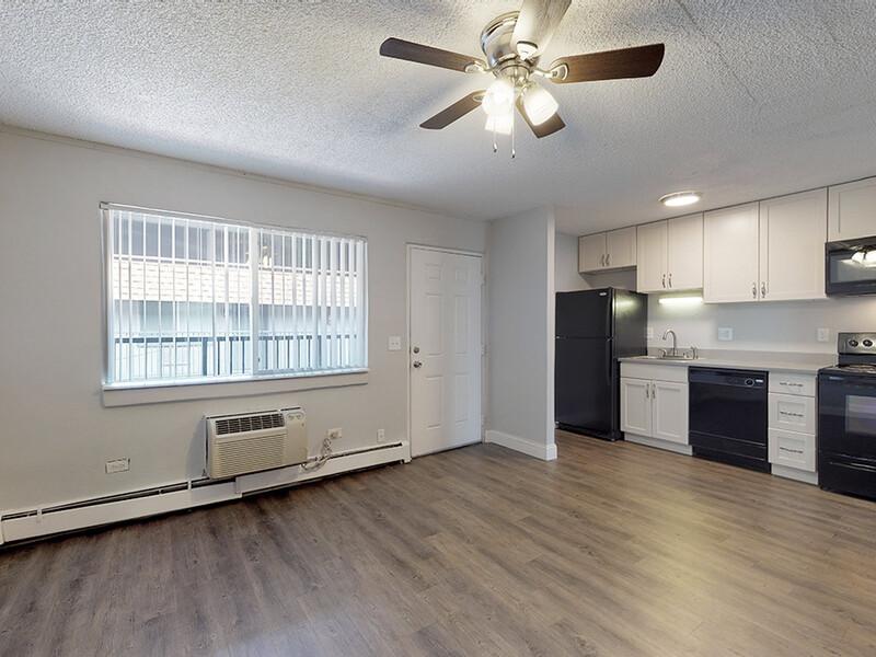 Front Room and Kitchen | Montego Flats Apartments in Aurora, CO