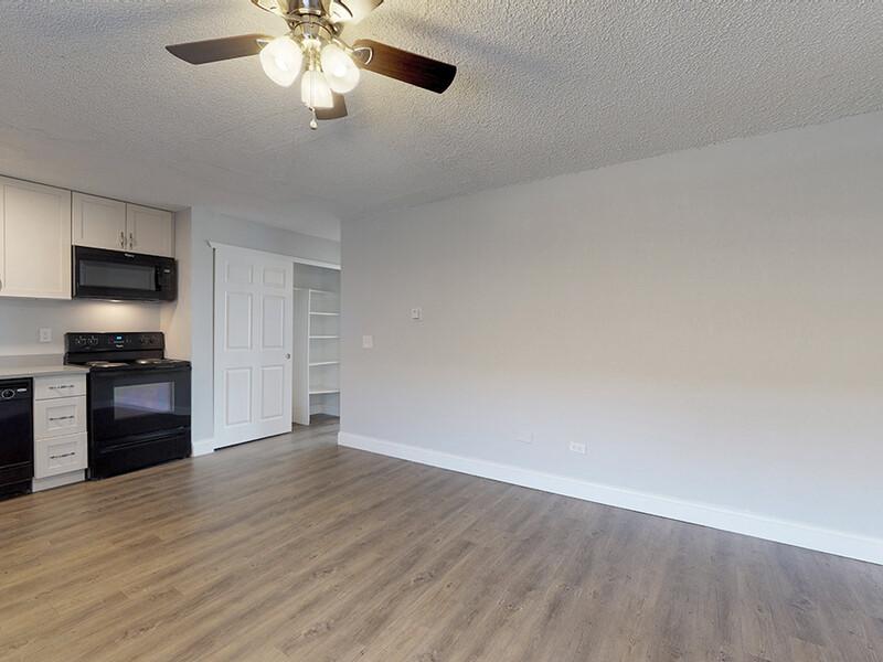 Living Room and Kitchen | Montego Flats Apartments in Aurora, CO