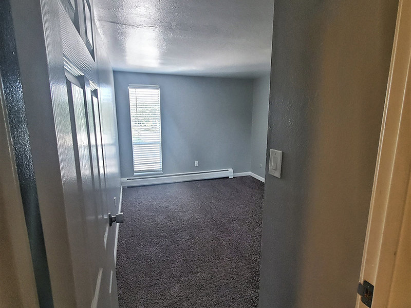 Spacious Bedroom | Riviera Apartments in Northglenn, CO