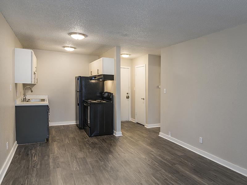 Living Room and Kitchen | The Reserve Apartments in Colorado Springs