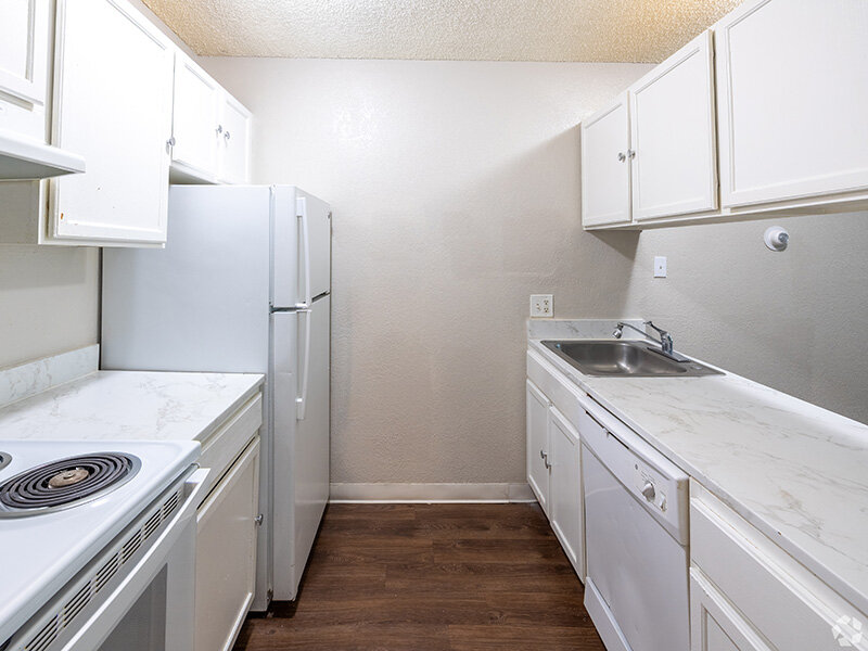 Kitchen with White Appliances | Bradburn Gardens Apartments