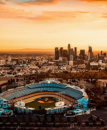 Enjoy a sunny day at a ball game.