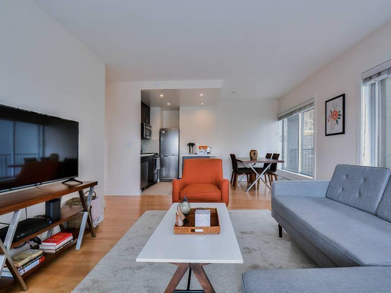 Living Room and Kitchen | The Pinnacle at Nob Hill Apartments