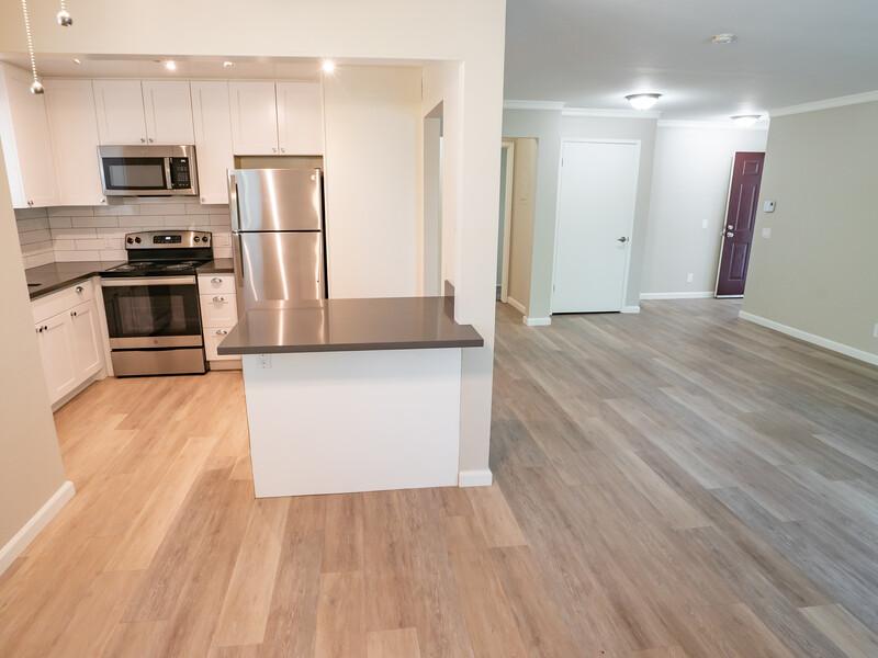 Kitchen and Front Room | McInnis Park Apartments in San Rafael, CA
