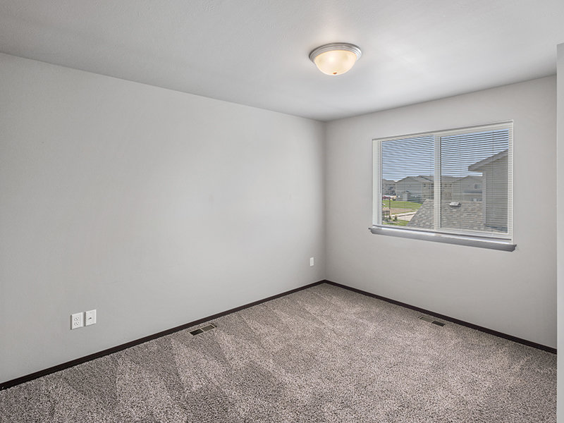 Carpeted Bedroom | 41st Street Commons in Sioux Falls, SD
