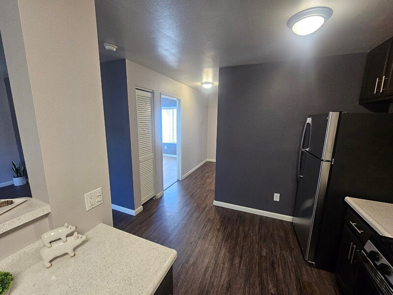 Kitchen and Hallway to Bedroom | The Grand at 5746