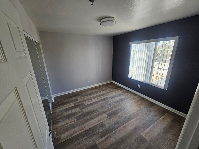 Bedroom with Ceiling Light and Wood Style Flooring | The Grand at 5746