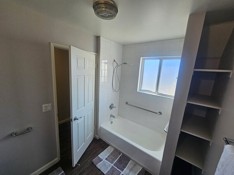 Bathroom with Built In Linen Closet | The Grand at 5746