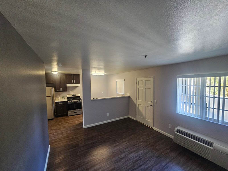 Kitchen and Wood Style Flooring and Apartment Entry | The Grand at 5746