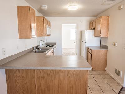 Fully Equipped Kitchen | Pepperwood Village Apartments in Ammon, ID
