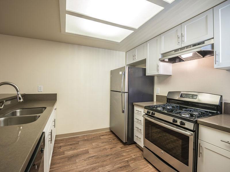 Apartments in Upland CA-Parc Claremont Modern Kitchen with Matching Stainless Steel Appliances and Double Sink