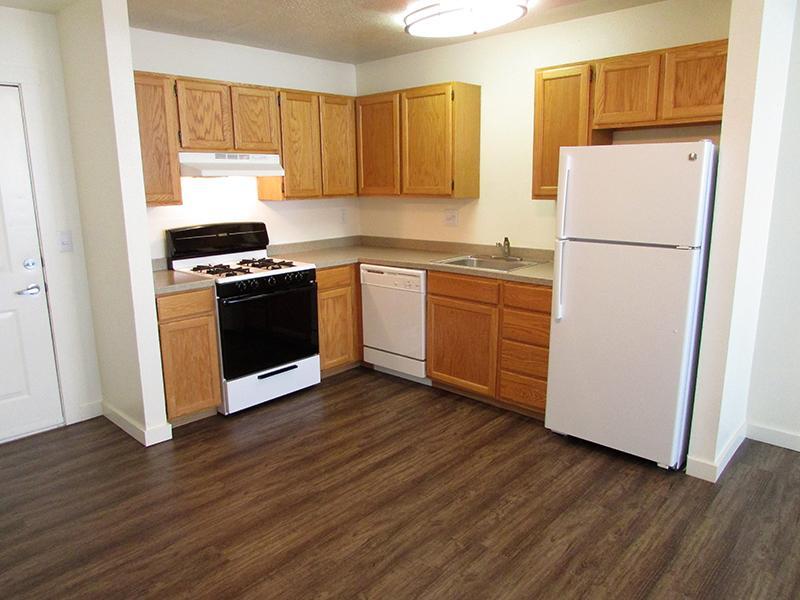 Kitchen with White Appliances | Goldstone Place Apts in Clearfield, UT