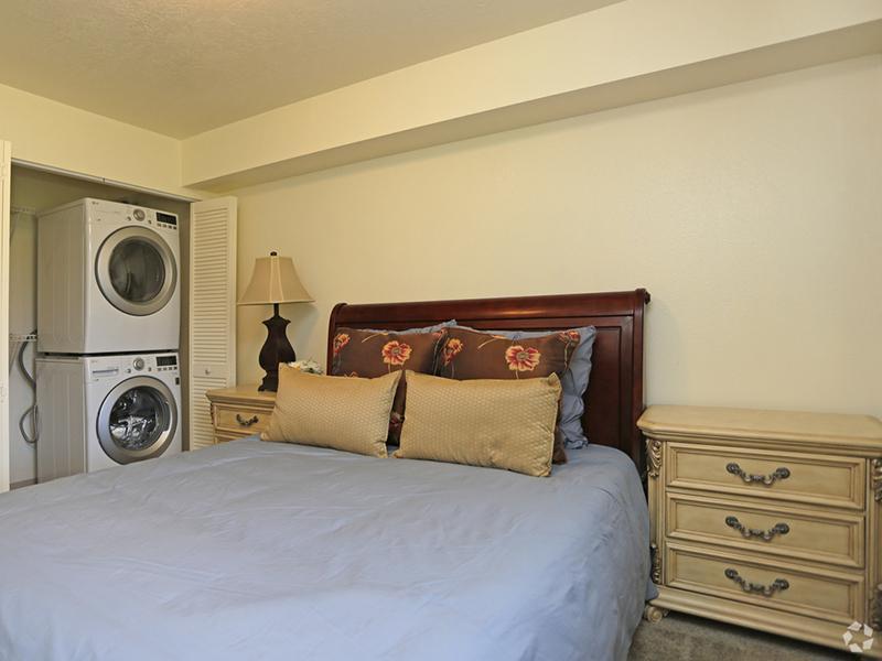 Bedroom and Laundry | Goldstone Place Apartments