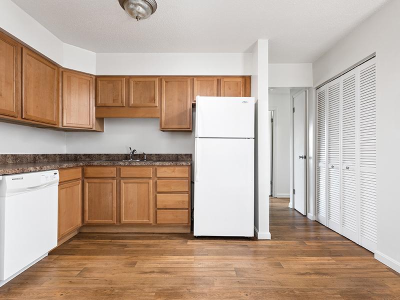 Kitchen and Hallway | Kimber Green Apartments in Evansville, IN