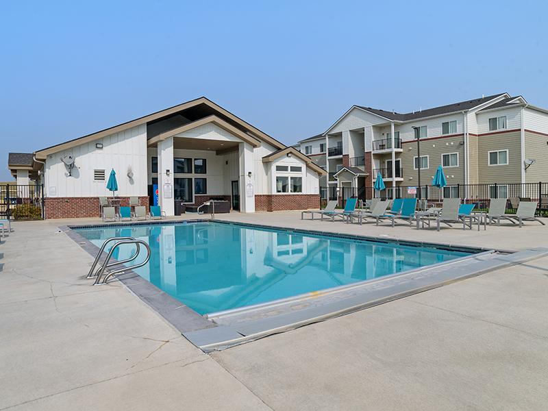 Pool with Lounge Area | Gateway Apartments in Rapid City, SD