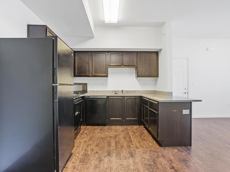 Kitchen with Dark Cabinets | Gateway Apartments in Rapid City, SD