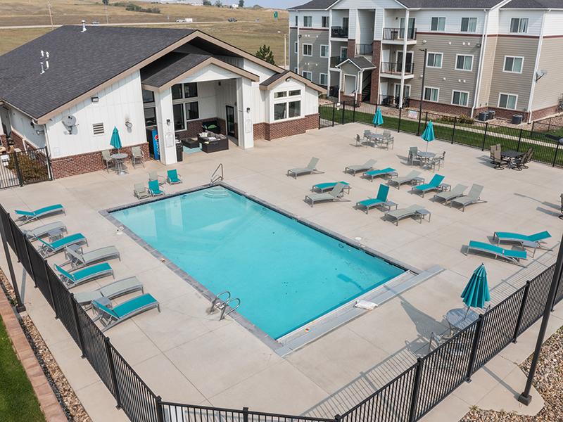 Swimming Pool with Seating | Gateway Apartments in Rapid City, SD