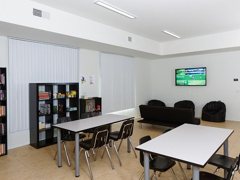 Seating Area with Tables | Chula Vista, CA, Sunrose Apartments