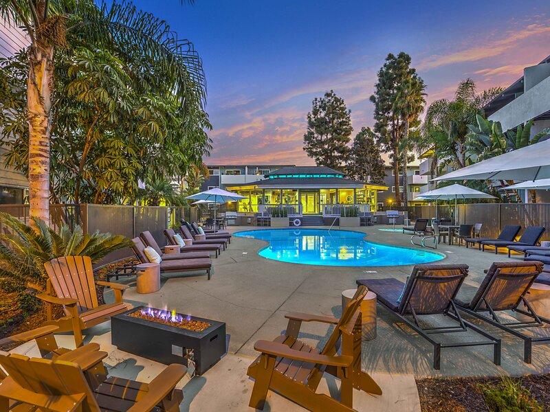 Poolside Seating | Atwater Cove Apartments in Costa Mesa, CA