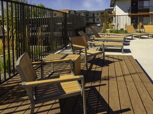 Joshua Tree Apartments | Exterior Pool Chair | SLC