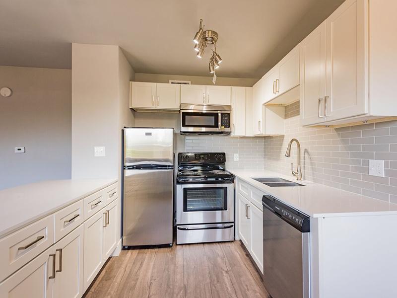 Kitchen with White Cabinets and Counters | Joshua Tree Apartments Salt Lake City, UT