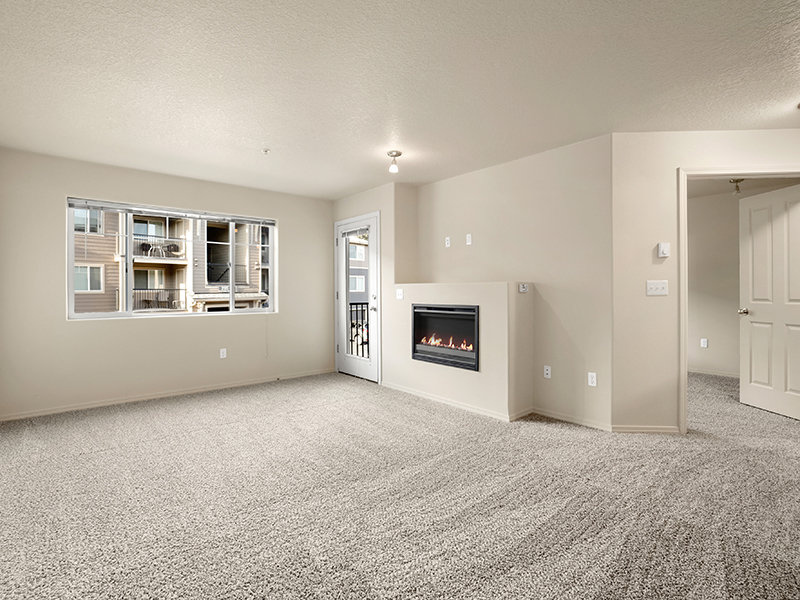 Living Room with Fireplace | Cedar Falls Apartments in Portland, OR